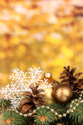 Photo: Christmas decoration on yellow background Christmas decoration on yellow background