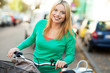 Woman riding a bike in the city