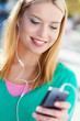 Woman with mp3 player