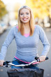 Portrait of woman with bike