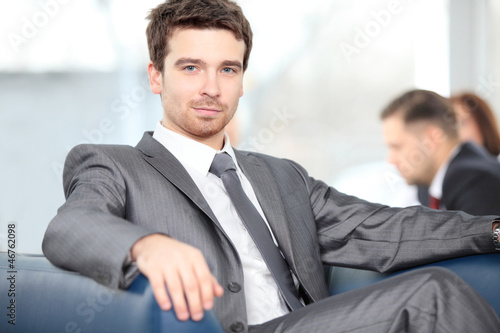 Photo: Successful young business man at the office Successful young business man at the office