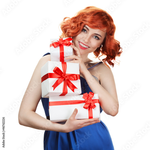 Photo: Young happy woman with a gift. Isolated over white Young happy woman with a gift. Isolated over white