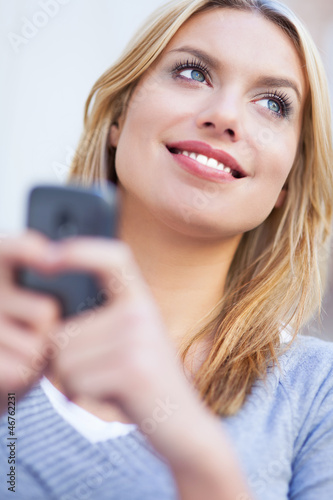 Photo: Woman with mobile phone Woman with mobile phone