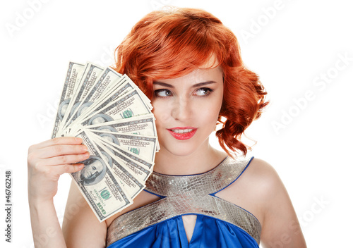 Photo: Young happy woman with dollar notes in hand. Isolated on white b Young happy woman with dollar notes in hand. Isolated on white b