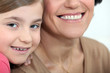 Child sharing a moment with her mother
