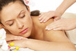 Relaxed young woman at spa salon