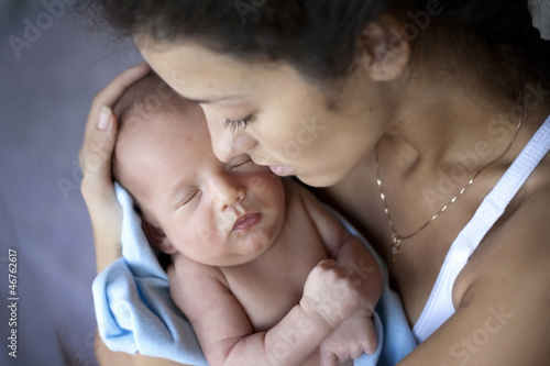 Photo: young mother with a baby young mother with a baby