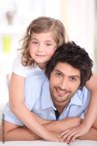 Photo: Father playing with daughter Father playing with daughter