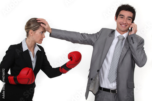 Photo: A businesswoman trying to compete. A businesswoman trying to compete.