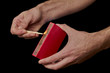 Photo: A Match ignited by rubbing the match head against a match box. A Match ignited by rubbing the match head against a match box.