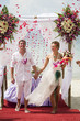 happy couple get married on the beach in Thailand