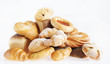 Photo: Composition with bread and buns on light background Composition with bread and buns on light background