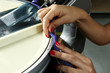 Photo: Industrial textile factory, woman at work, detail Industrial textile factory, woman at work, detail