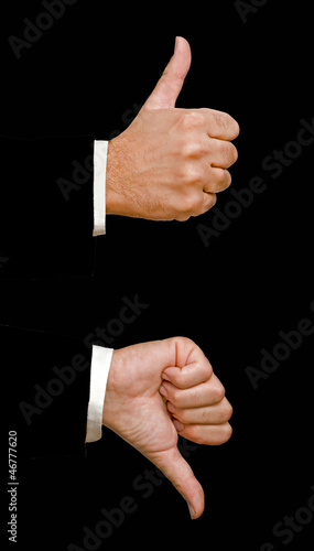 Photo: hands showing thumb up and thumb down hands showing thumb up and thumb down
