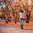 Woman in autumn park