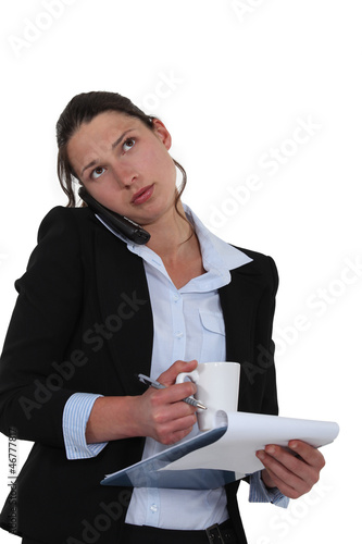 Photo: Woman multitasking Woman multitasking