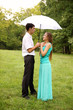standing under a umbrella