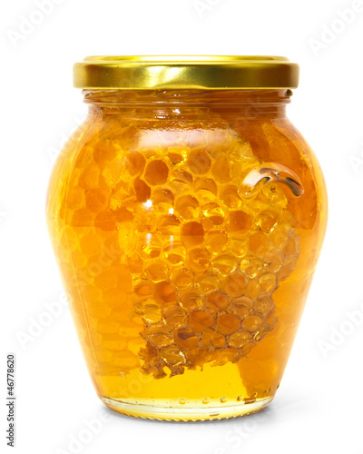 Photo: Honey jar isolated on white Honey jar isolated on white