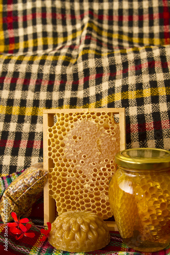 Photo: Jars of honey and honeycomb. Honey products Jars of honey and honeycomb. Honey products