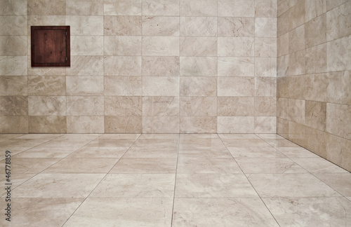 Photo: Empty room with marble slabs. Background Empty room with marble slabs. Background