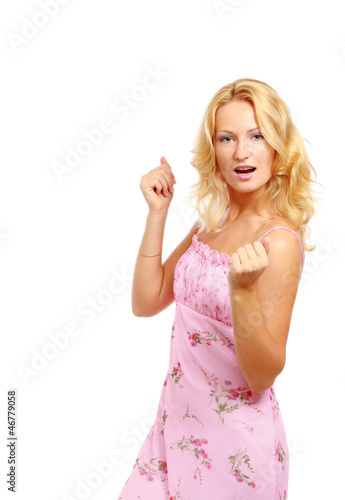 Photo: A young woman with something in her fists A young woman with something in her fists