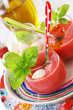 Delicious cold gazpacho soup with mozzarella and basil.
