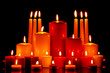 Large group of mixed candles burning