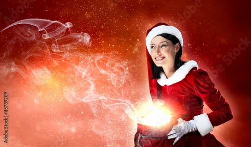 Photo: beautiful girl in santa costume beautiful girl in santa costume
