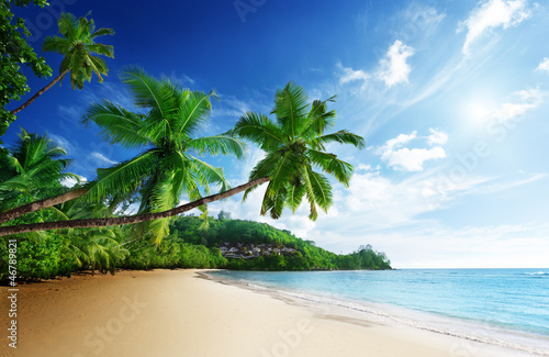 Photo: sunset on beach Anse Takamaka of Mahe island, seychelles sunset on beach Anse Takamaka of Mahe island, seychelles
