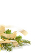 Christmas seasonal background with spruce and golden beads