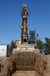 excavators digging sewer trench