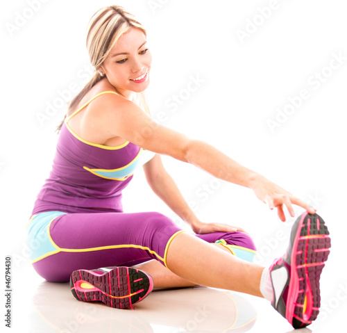 Photo: Fit woman stretching Fit woman stretching