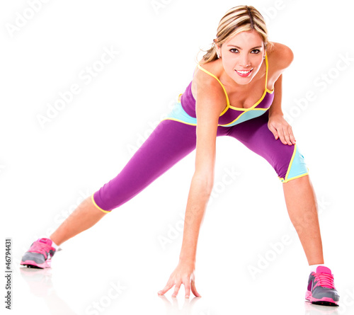 Photo: Athletic woman exercising Athletic woman exercising