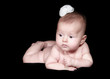 Little girl a on black background.
