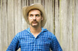 cowboy on wooden background