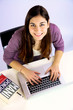 Happy student working with pc