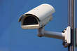 Photo: white cctv security camera on blue background white cctv security camera on blue background