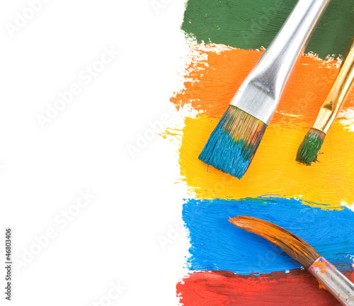 Photo: brush and color paints on white brush and color paints on white