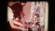 Old movie from the 70s Decorating the tree for Christmas.