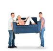 Photo: Two men carrying a couch with a woman smiling Two men carrying a couch with a woman smiling