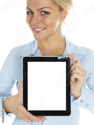 Photo: Pretty woman presenting her touchpad with copyspace Pretty woman presenting her touchpad with copyspace