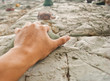 One hand to climb the cliff