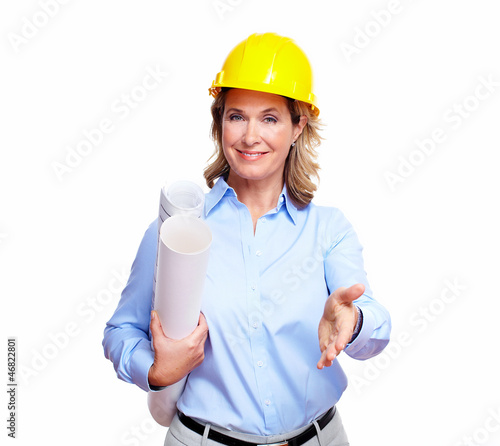 Photo: Architect woman with a plan. Architect woman with a plan.
