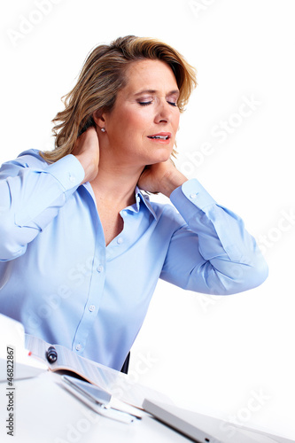 Photo: Business woman having a headache. Business woman having a headache.