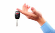 Hand with a car key.