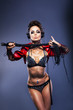 Sexy fetish woman dj in lingerie holding whip with headphones