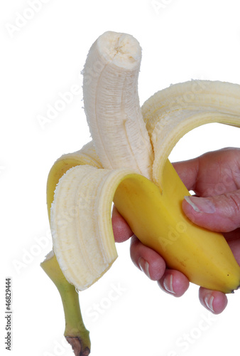 Photo: Hand holding a fresh banana Hand holding a fresh banana
