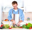 Foto: Young Man Cooking. Healthy Food Young Man Cooking. Healthy Food
