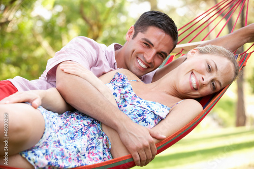 Photo: Couple Relaxing In Hammock Couple Relaxing In Hammock