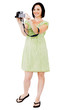 Smiling woman holding home video camera